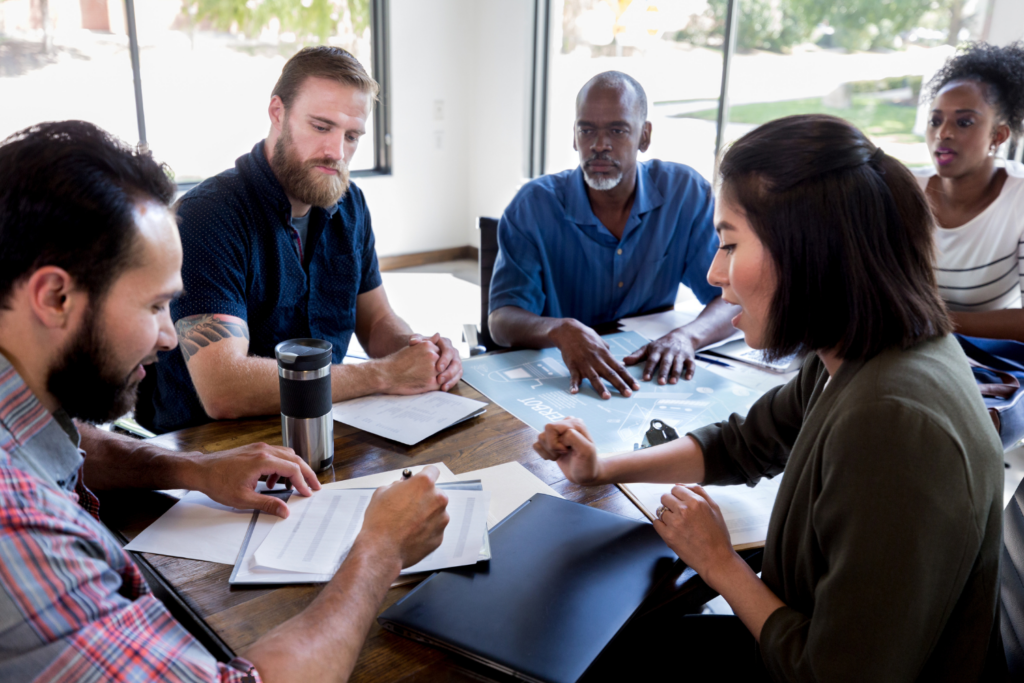 Workplace team engaged in a collaborative manner